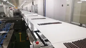 Sistema automático de envasado de obleas rellenas y chocolate