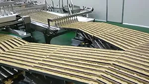 Sistema automático de envasado de snacks apilados