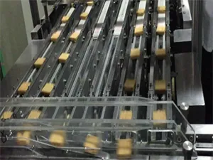 Sistema automático de alimentación y envasado