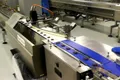 Sistema automático de envasado de obleas rellenas y chocolate