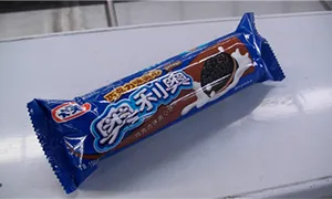 Envasadora horizontal flow pack SF-N sin bandeja para galletas en posición vertical