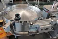 Sistema automático de envasado con alimentador de doble tolva