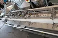 Sistema automático de envasado con alimentador de doble tolva